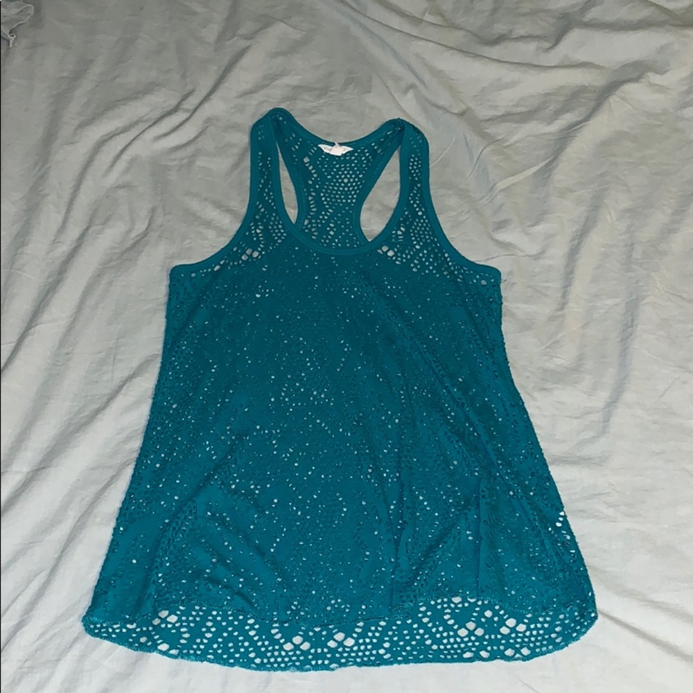 Intricate cutouts blue tank top